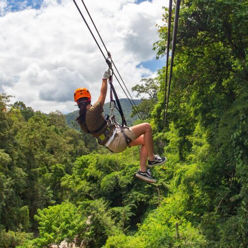 Zip lining through the jungles in Belize